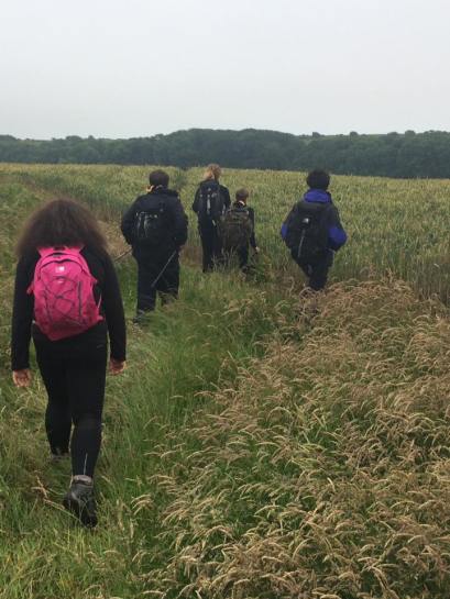The hike took us through fields and along the coastal path